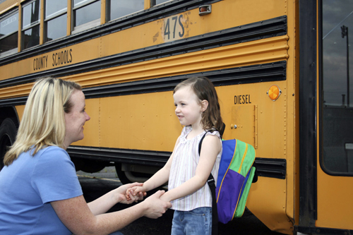 mom seeing daughter off to school