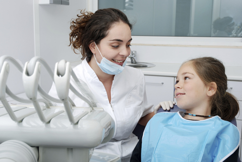 young girl at dentist