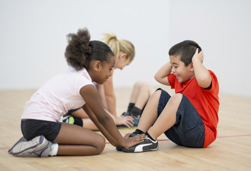 Kids doing sit ups