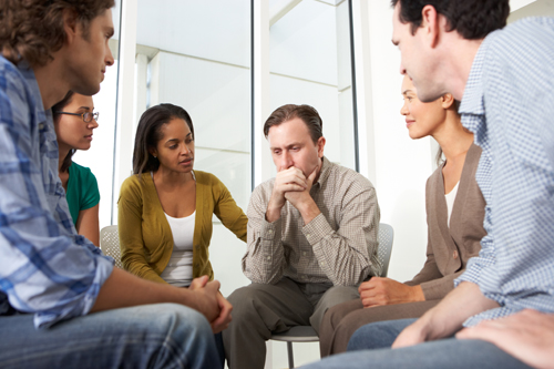 man at support group
