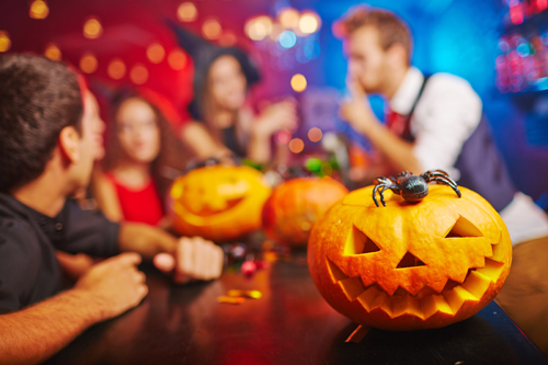 Halloween party with jack-o-lantern on the table