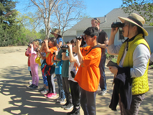 Bionerds - Kids viewing wildlife through binoculars