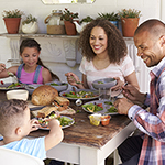 family eating healthy meal together Thumbnail