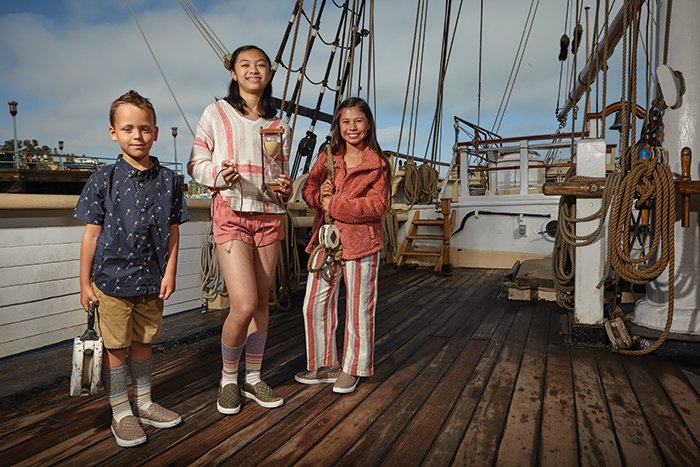 2018 Bubble-Dash Winners standing on a ship