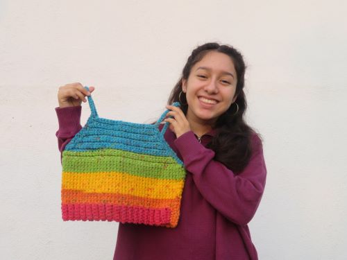 Young Entrepreneur Graciela Grande crochetes tops for charity