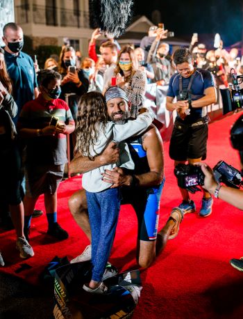 Local pastor, diagnosed with brain cancer, completes Ironman for his daughter, Hero.