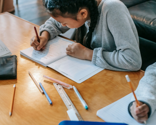 Girl journaling for student success