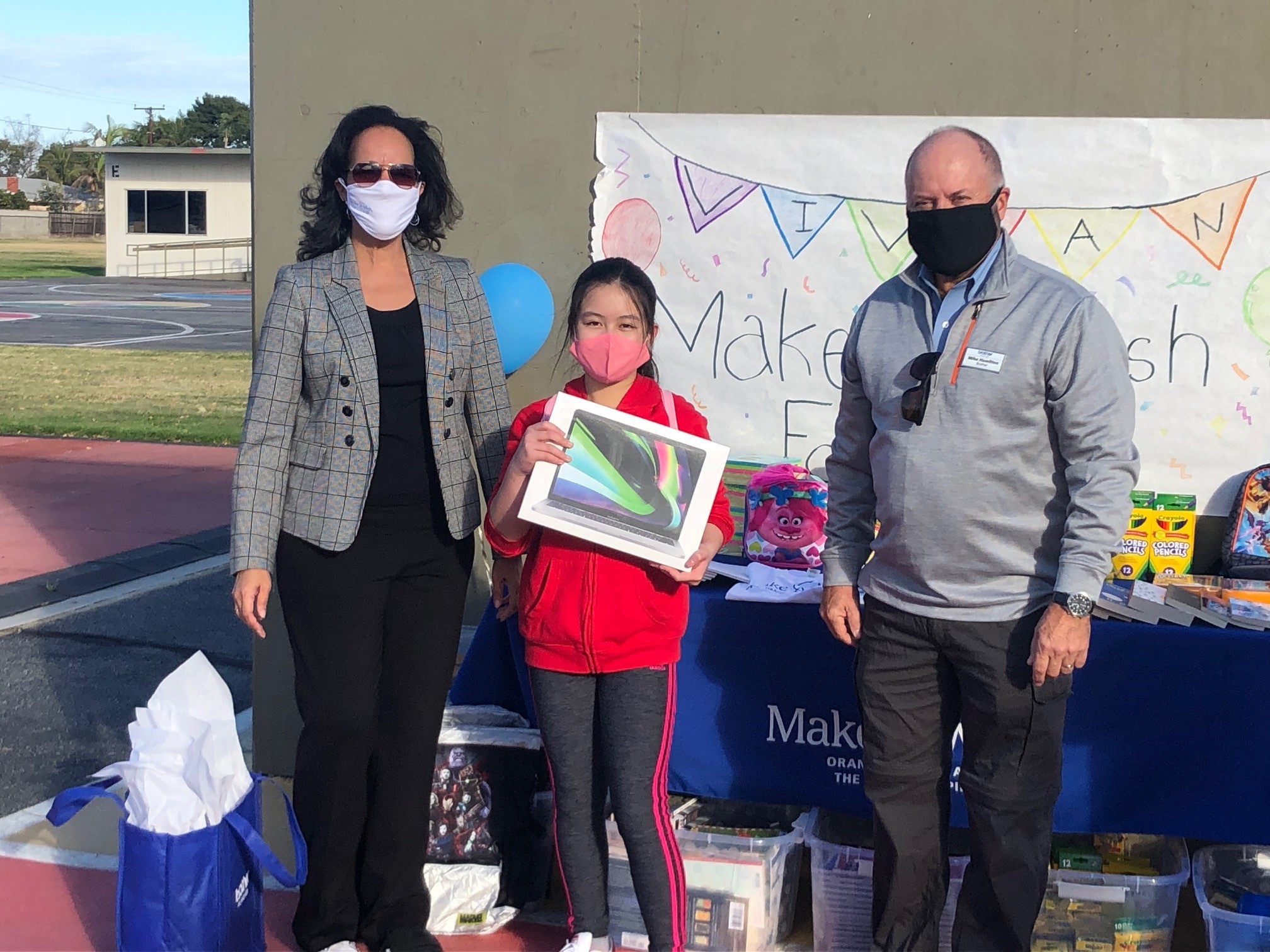 Gloria Jetter Crockett with wish kid Vivian granting wishes to critically ill children