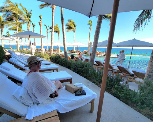Ronda Tierney relaxes poolside at the Grand Velas