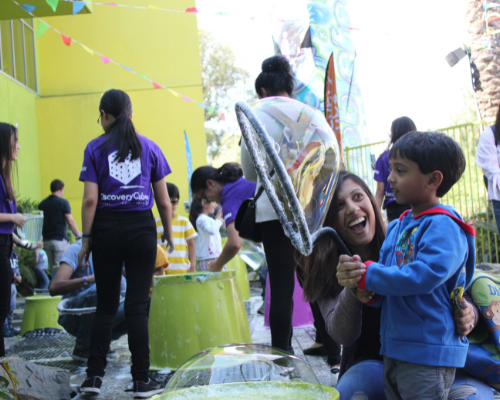 Children playing with bubbles at Discovery Cube's Bubblefest