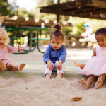 Three girls playing at playground