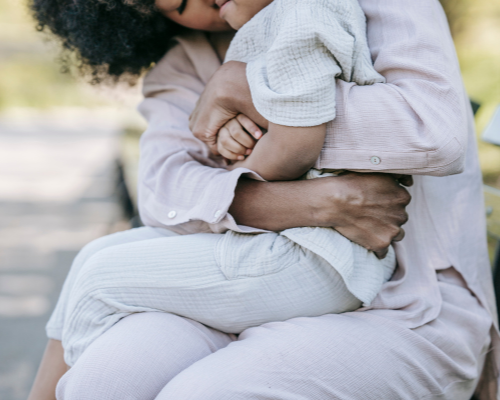 Mom comforting child