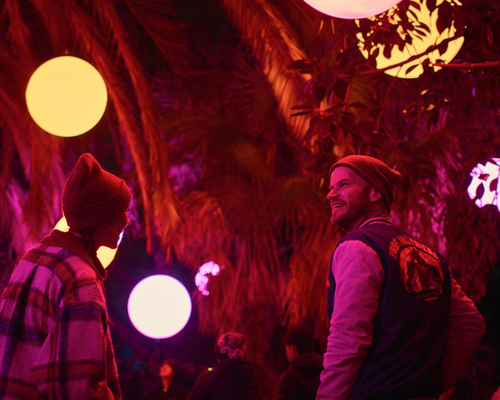 Couple enjoying the lights at Astra Lumina Los Angeles