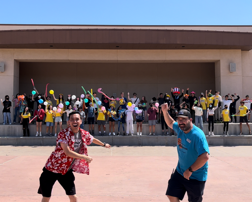 Teacher Phillip Chow dancing with Students at Beckman High School in Irvine