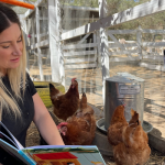 Danielle Judd Local Hero during storytime at the chicken coop on the farm. Children can tune in to live cameras through the farm's Smile Club program.