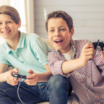 two brothers playing video games