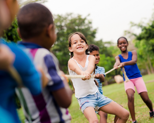 Children playing tug of war
