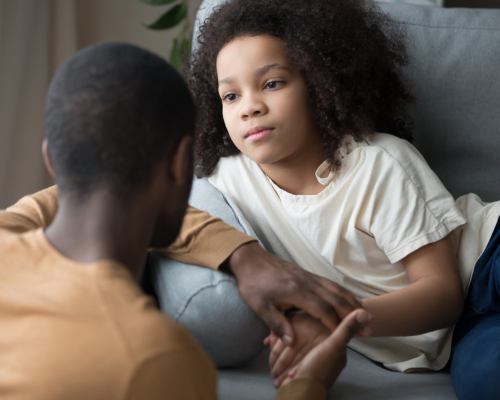 Father talking seriously with daughter