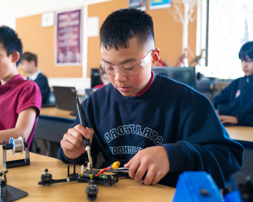 Stratford School student working on STEAM project in classroom