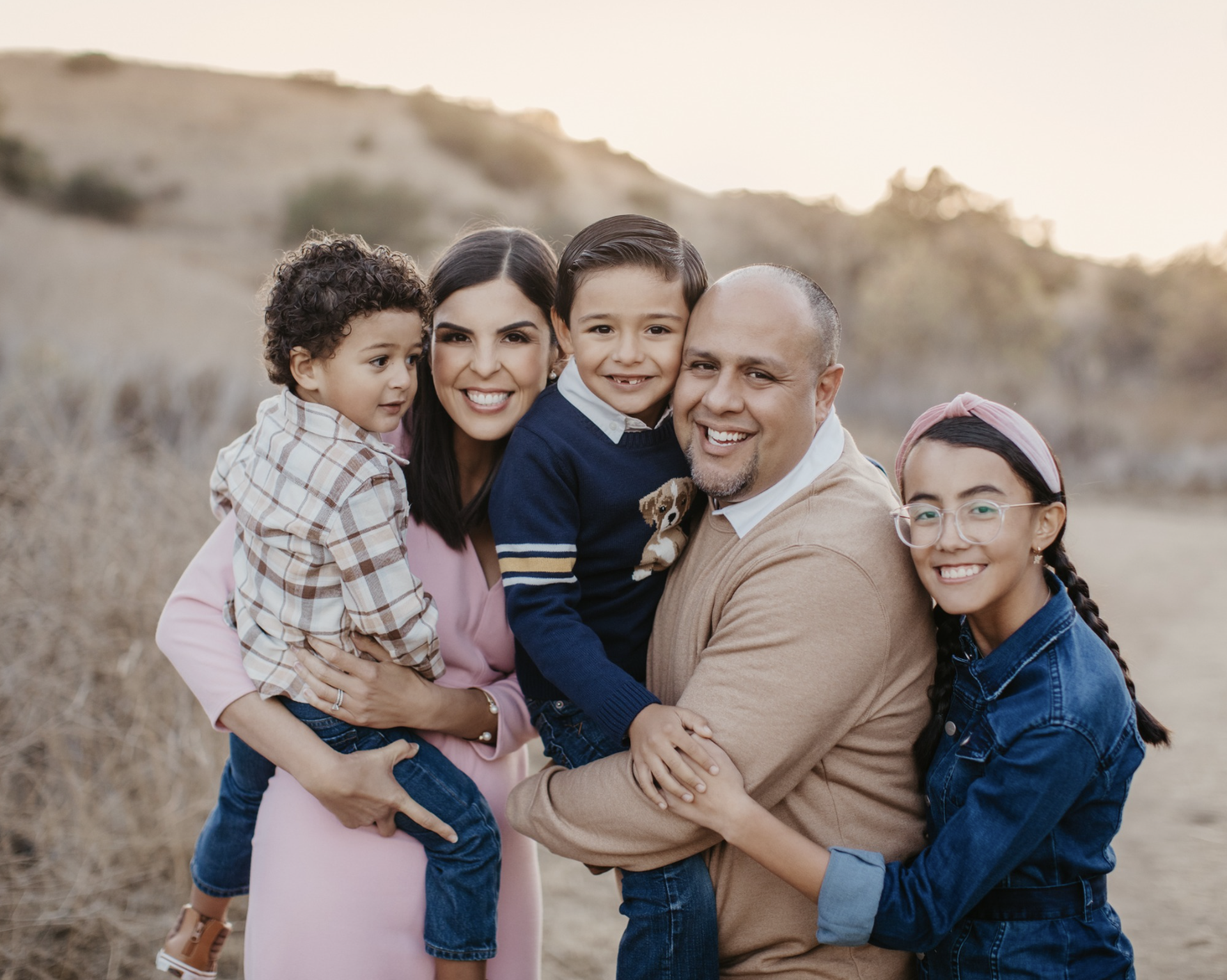 A family portrait of Varela Law Best Family Services Attorney