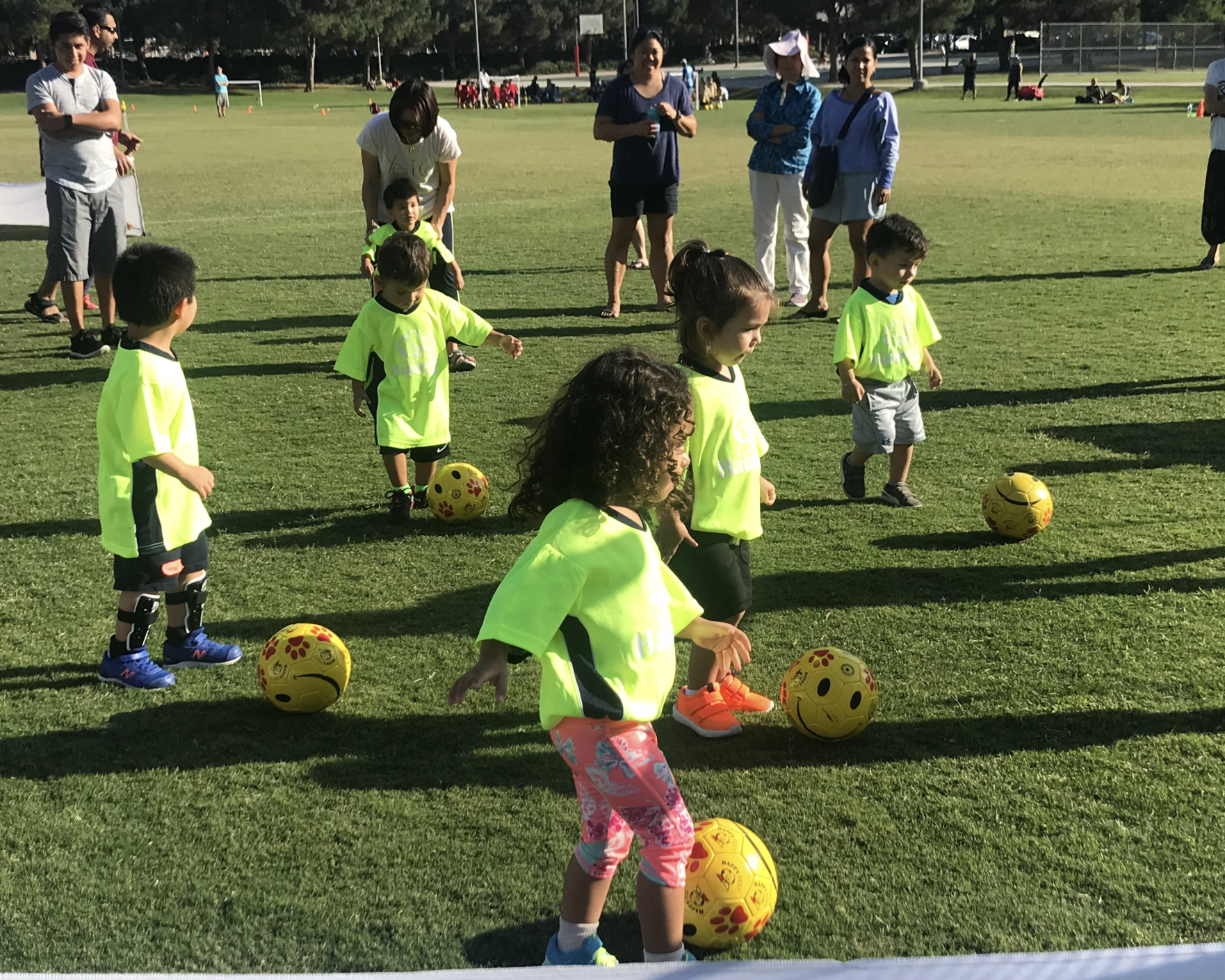 Kids playing soccer at HappyFeet SoCal Best Soccer Camp