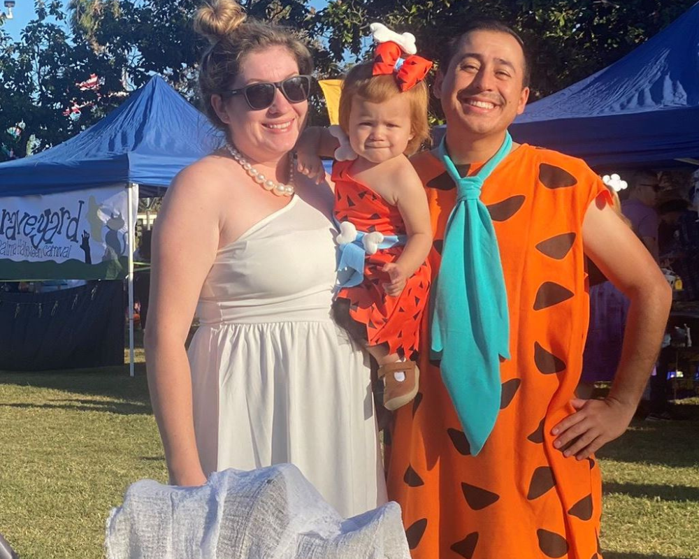 A family dressed up at the Flinstone family for La Palma’s Halloween Carnival
