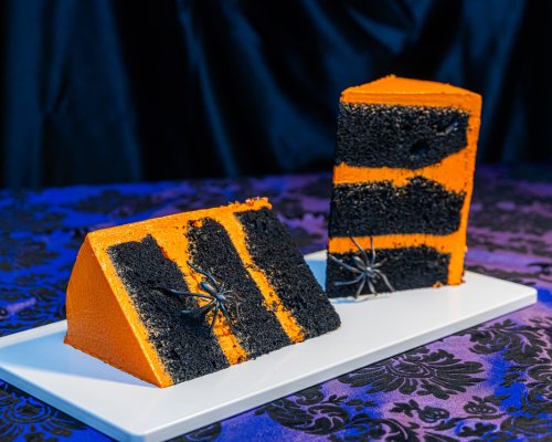 Two Black Velvet with Orange Buttercream Cakes with spider rings inside