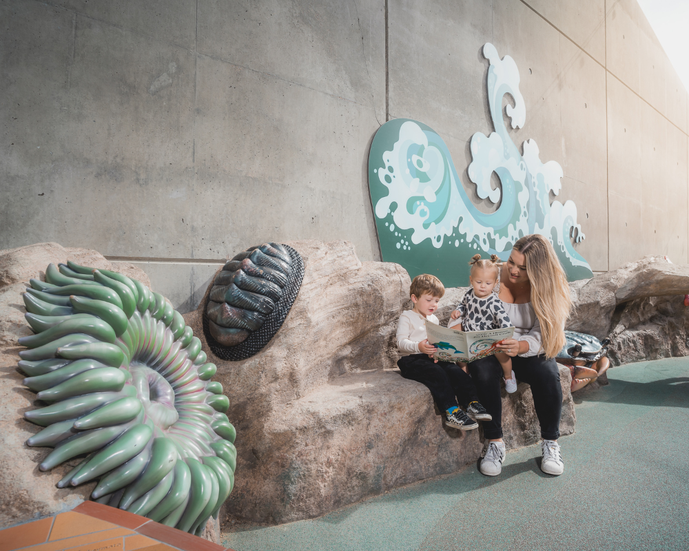 Ocean Institute Director of Education Tiley Russell with Boone, 2, and Sonny, 11