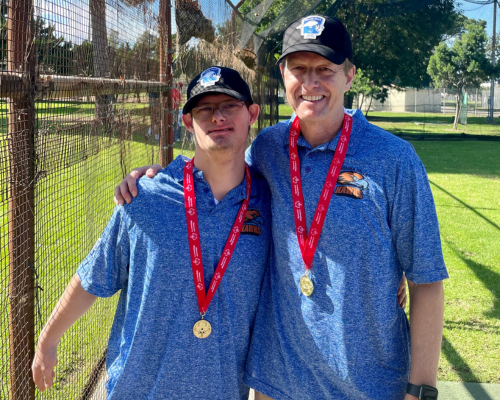 Alex Martin with his father Alan Martin winning Special Olympics gold metals