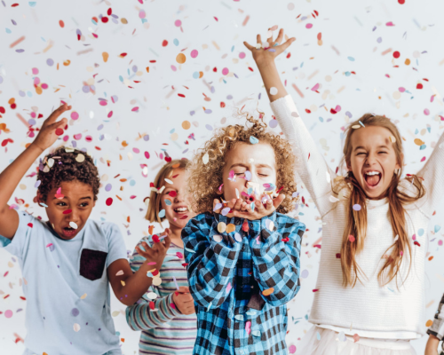kids celebrating with confetti